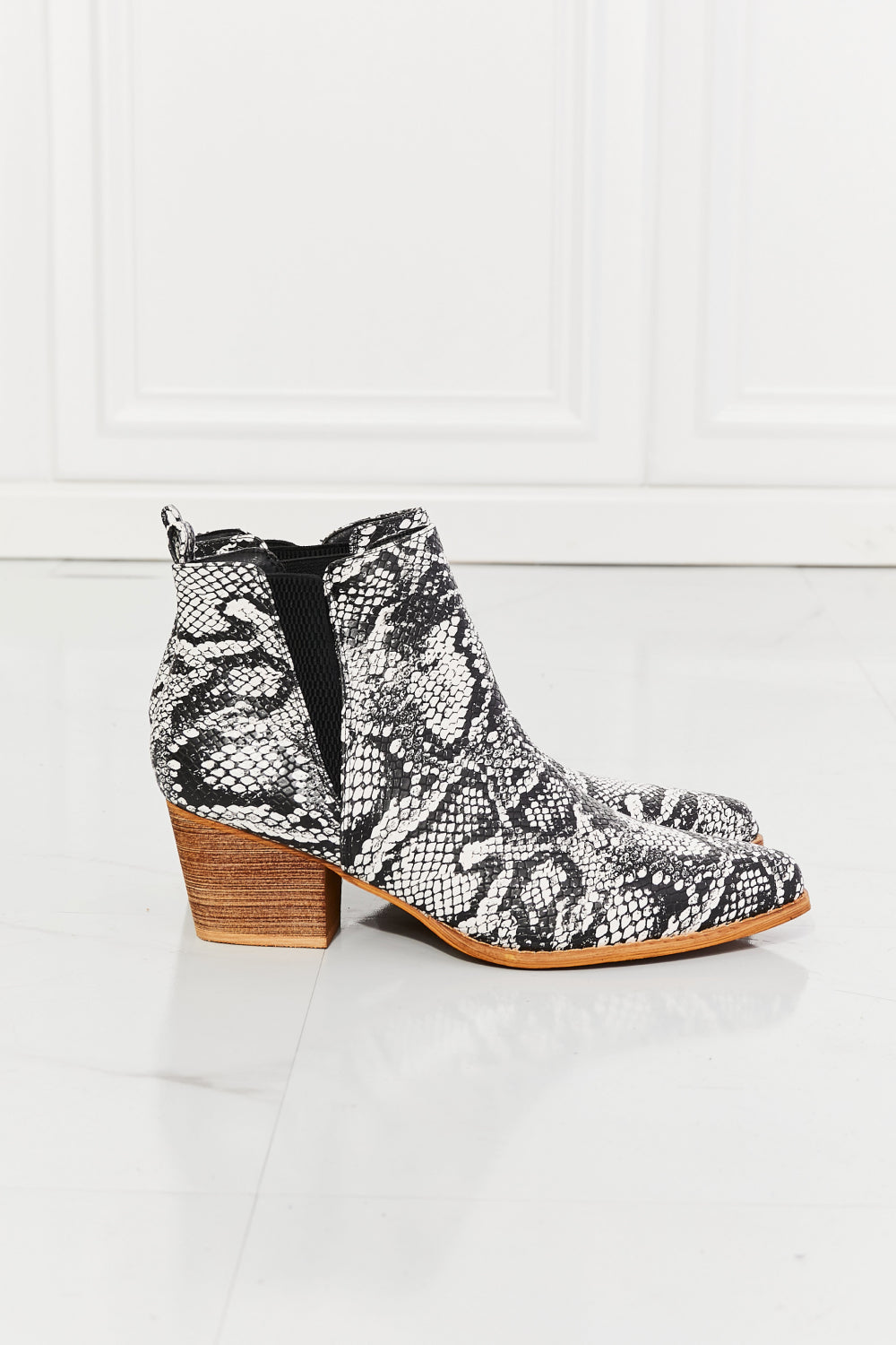  Pointed Toe Snakeskin Bootie w/Wooden Sole side view of booties.