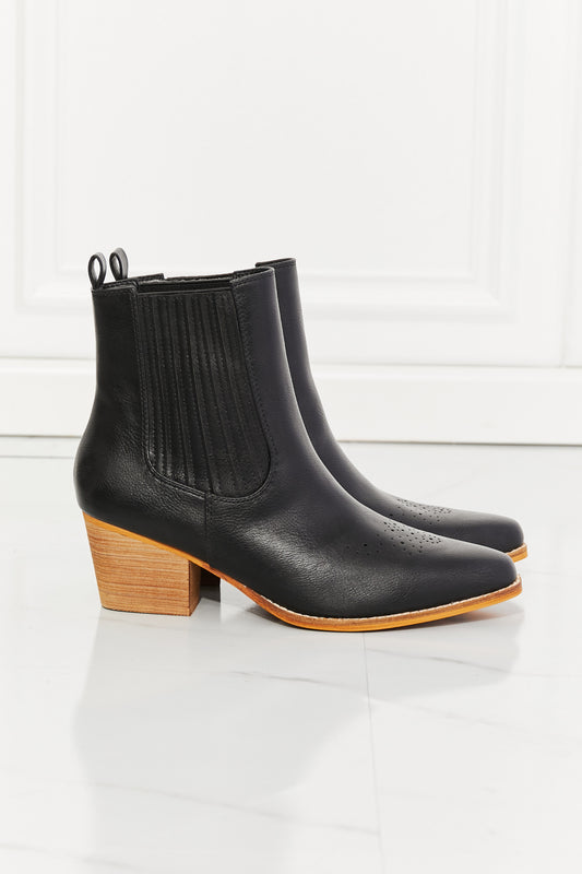 "Mission" Stacked Heel Chelsea Boot in Black side view of bootie